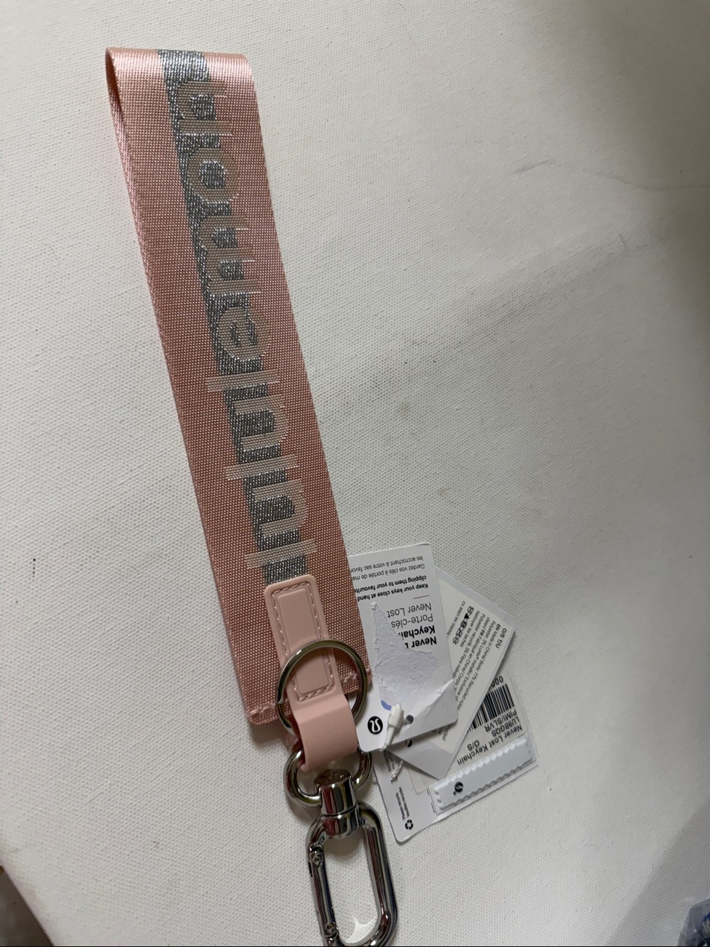 Lululemon Athletica Never lost Keychain . NEW with tags